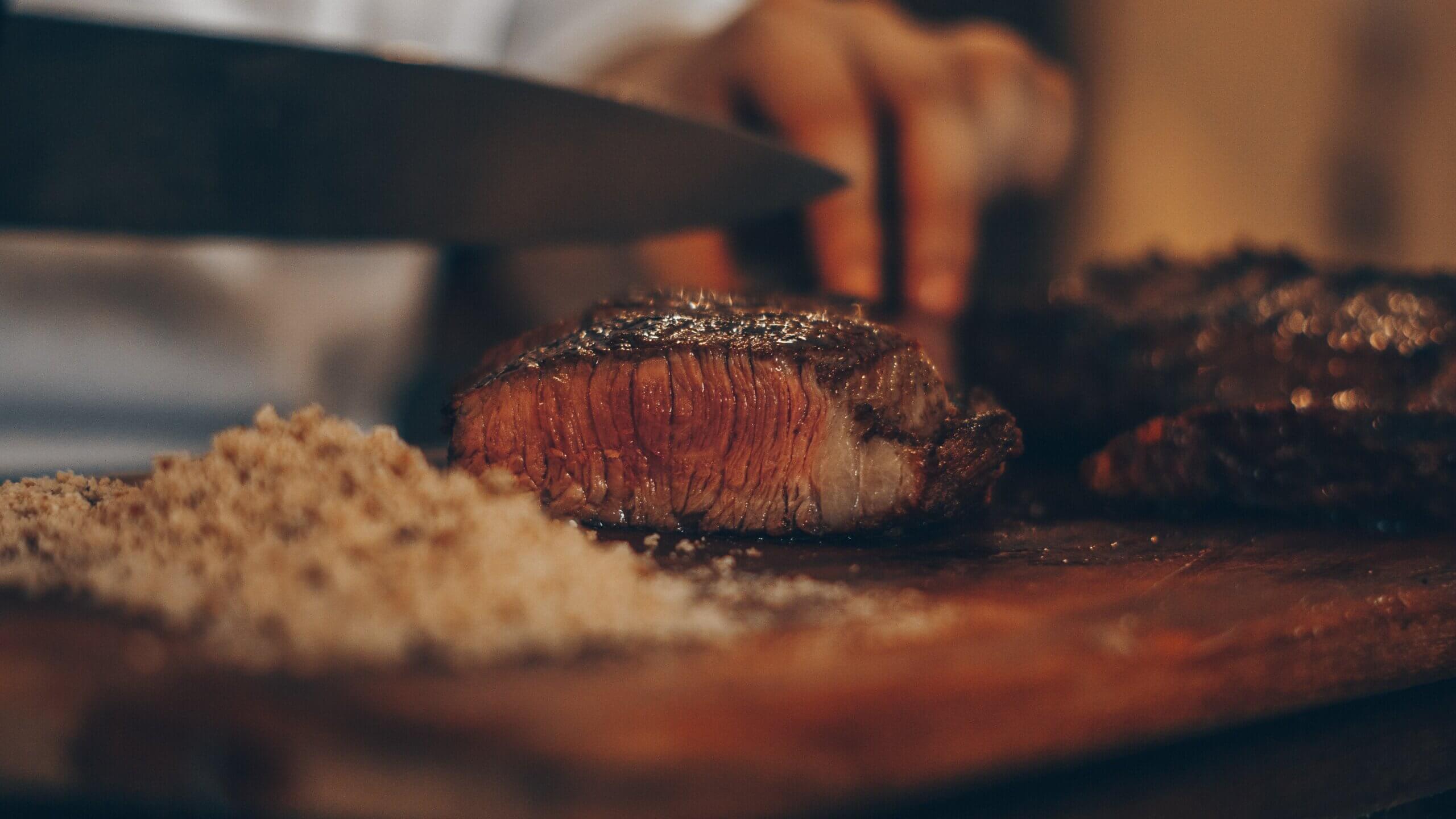 steak being sliced
