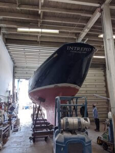 the sailing ship Intrepid in dry dock getting ready for repairs